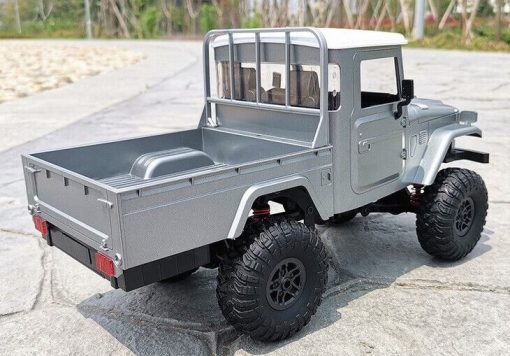 FJ-45 Cruiser 2.4G RC 1/12 scale 4WD Climbing Truck W/ 2 Rechargeable Batteries - Image 3